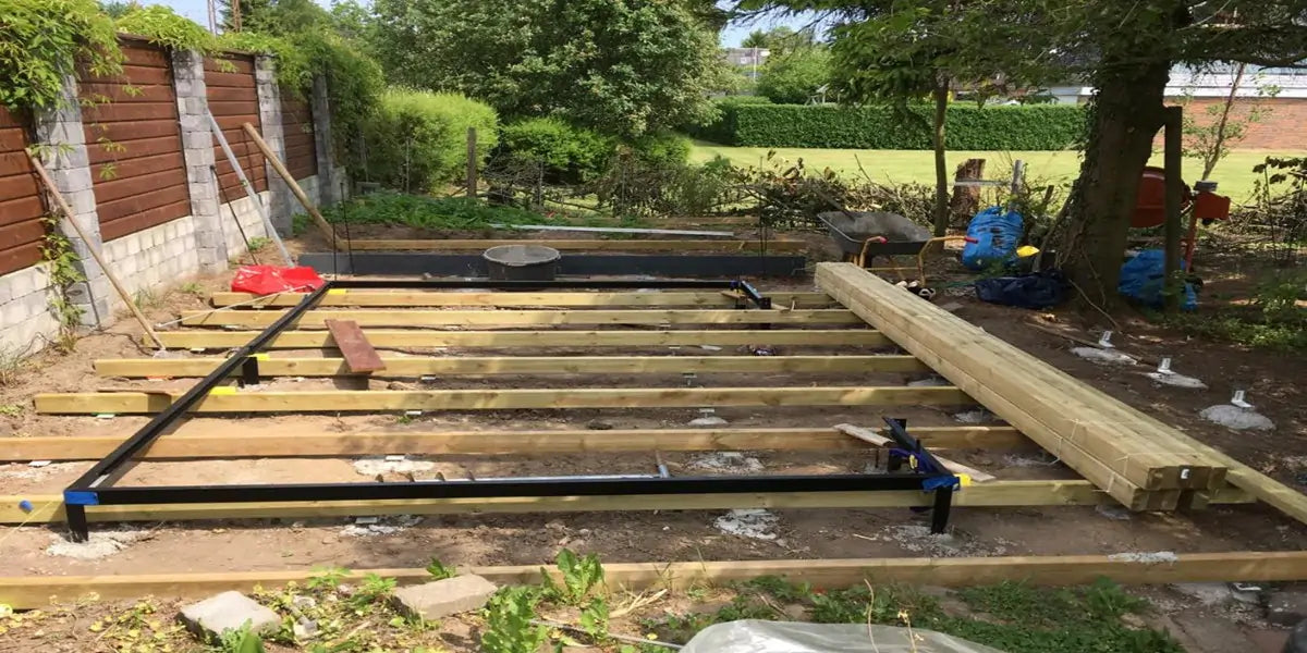 backyard greenhouse foundation