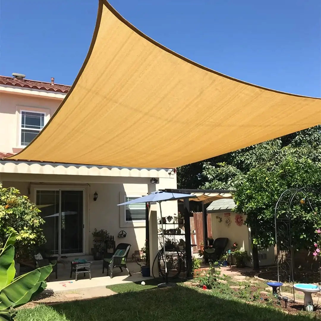 sand rectangular sunshade sail in backyard