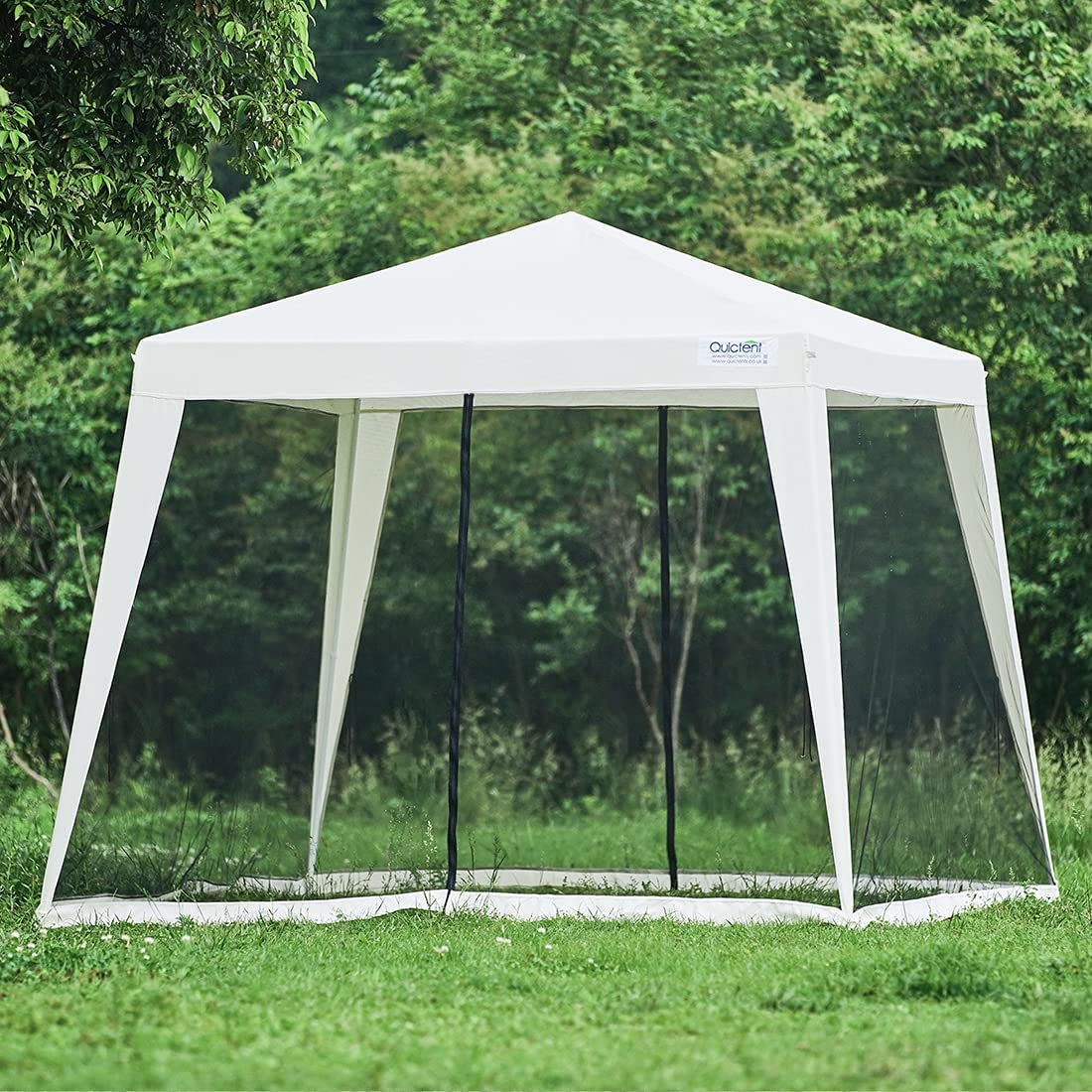 Quictent 10' x 8' mesh netting party tent is standing in the wild