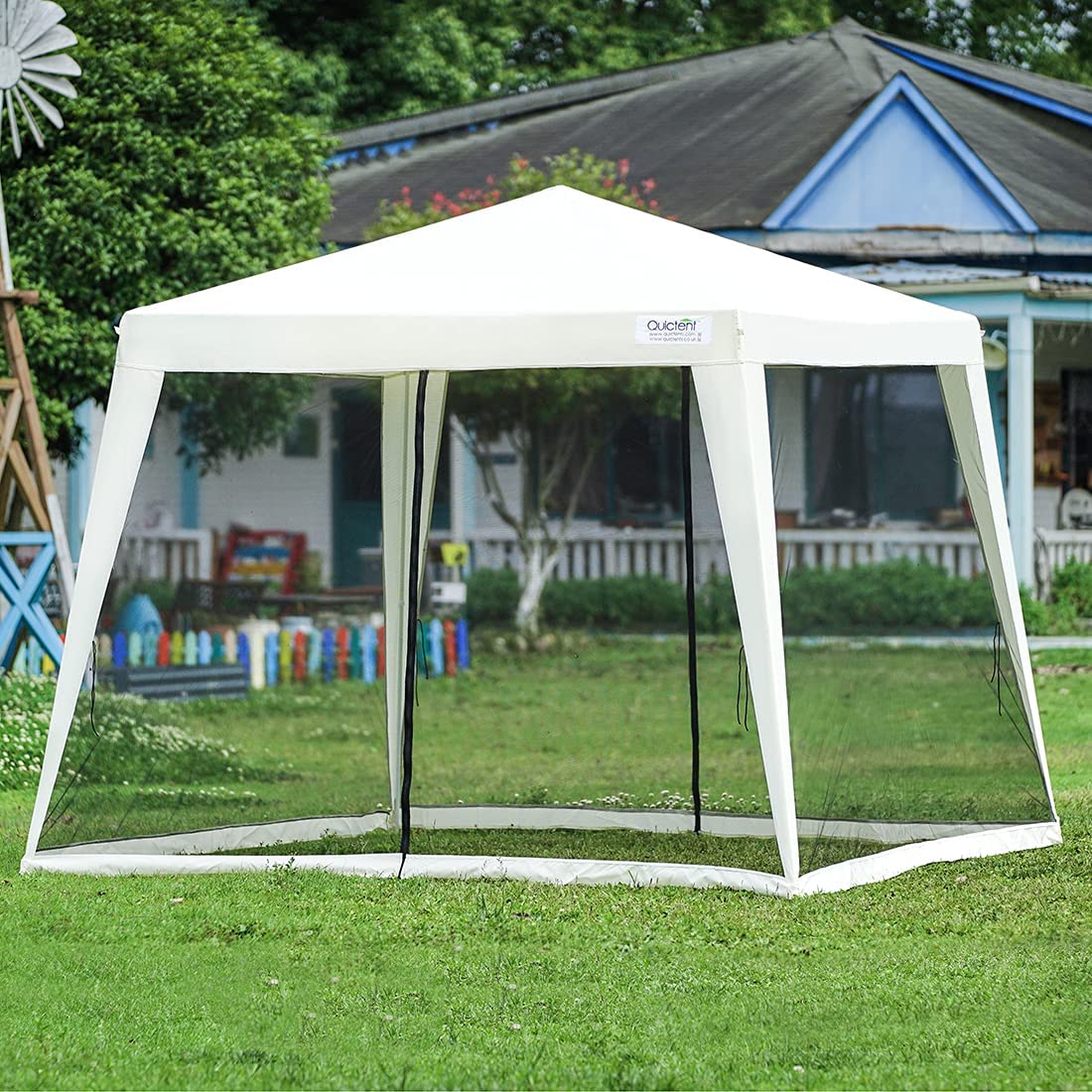 Quictent 10' x 8' mesh netting party tent is standing in the wild