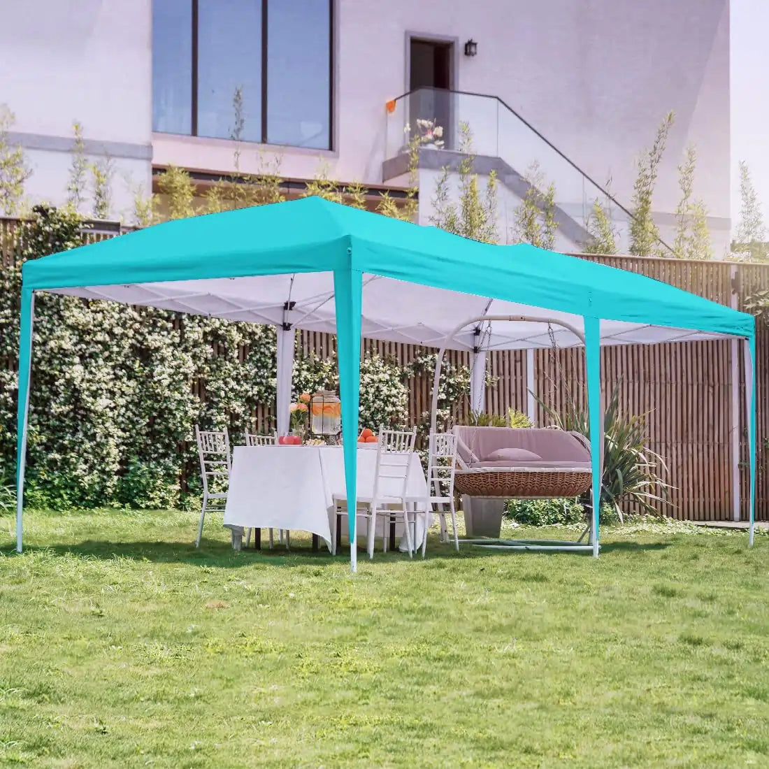 Turquoise 10x20 canopy tent outside#color_turquoise
